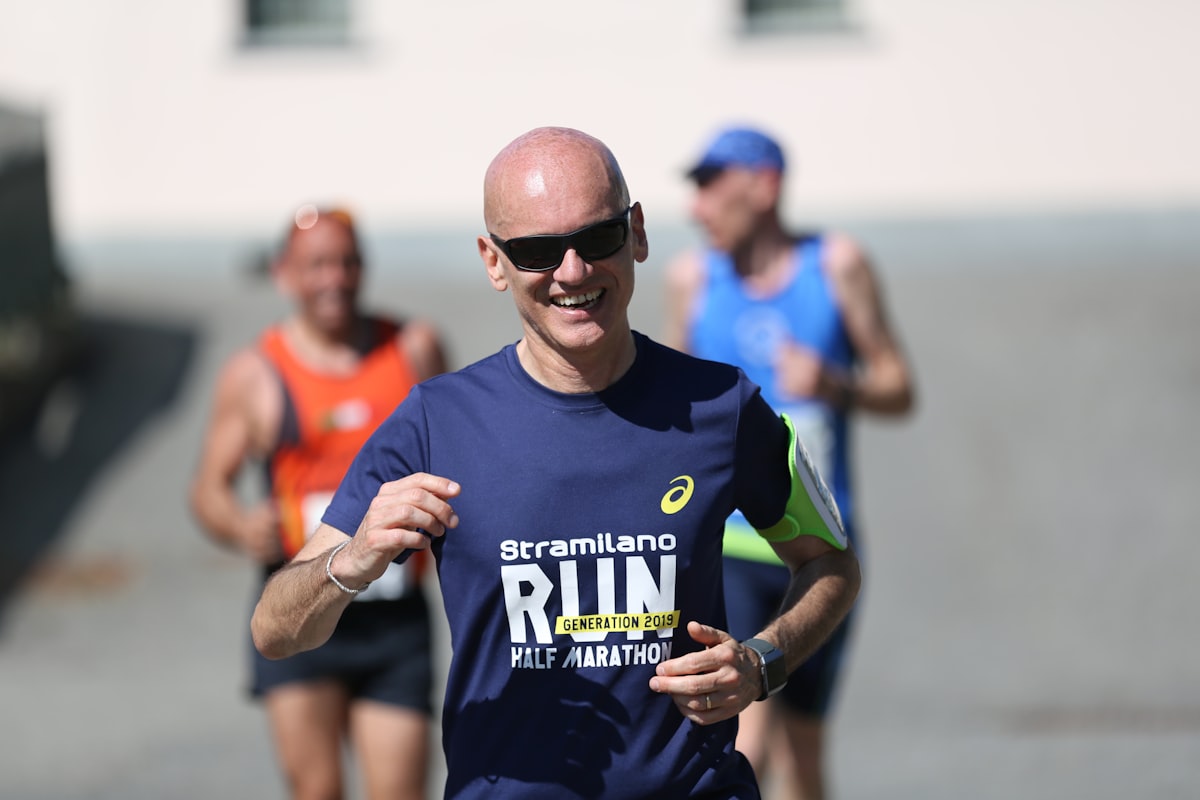 runner looking happy and at peace after morning run, sunshine