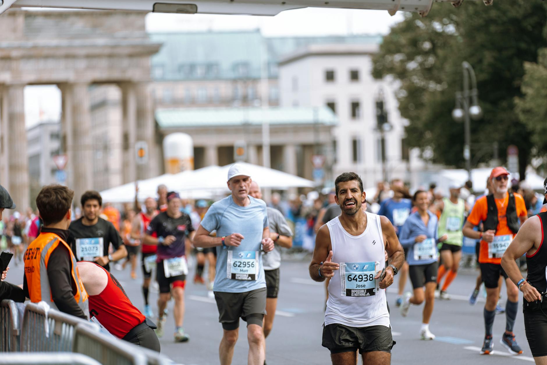 marathon training log with weekly milage chart, serious athlete desk